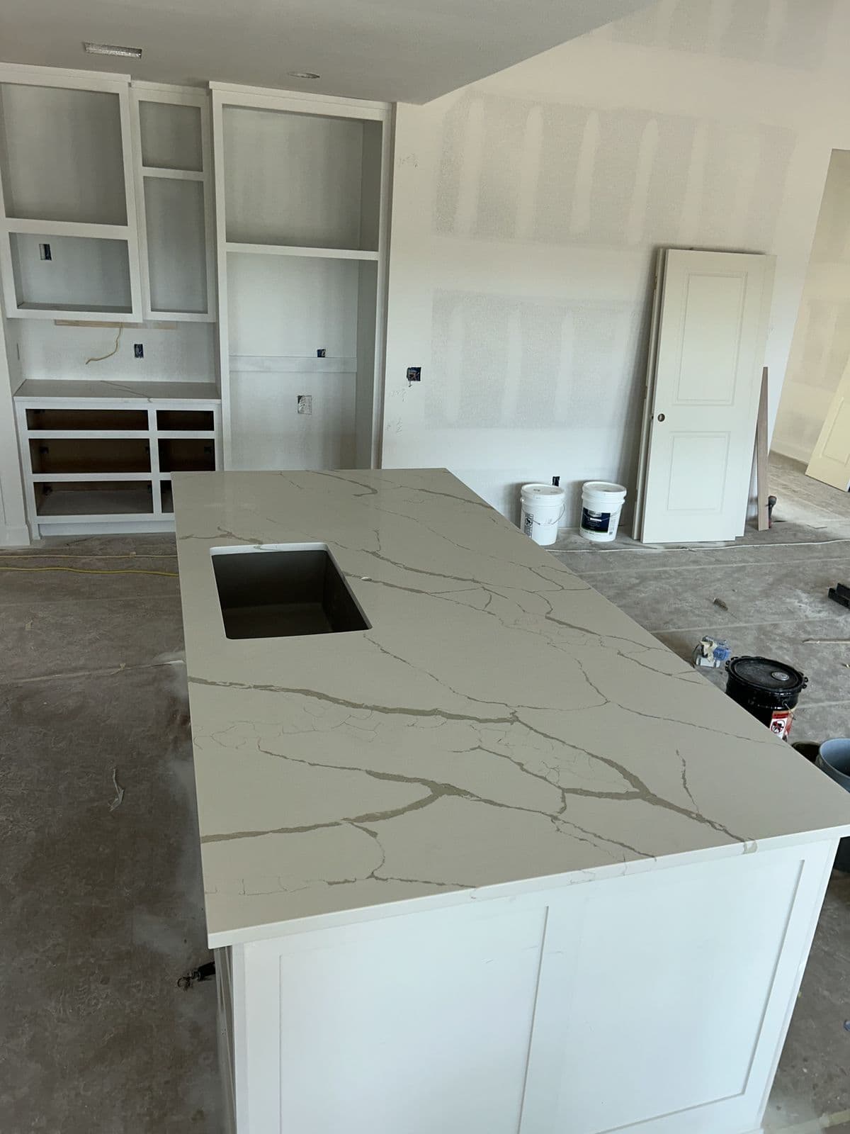White quartz kitchen island